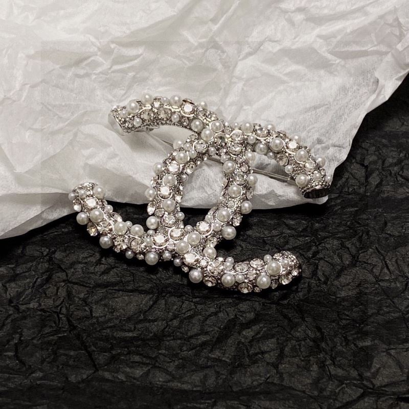 Ch**el brooches